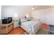 Bedroom with a ceiling fan, wood floors, natural light, and cute decor at 944 Angel Star Ln, Las Vegas, NV 89145