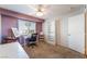 Bedroom with a ceiling fan, natural light from the window, and adaptable for office or studio at 944 Angel Star Ln, Las Vegas, NV 89145