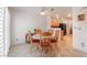 Cozy dining area with a round table and matching chairs, adjacent to kitchen at 944 Angel Star Ln, Las Vegas, NV 89145