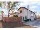 Charming two-story home with desert landscaping, block wall and inviting curb appeal at 944 Angel Star Ln, Las Vegas, NV 89145