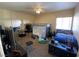 This bedroom offers mirrored closet doors, a lofted bed and neutral paint at 9580 W Reno Ave # 283, Las Vegas, NV 89148