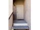 Welcoming front entrance with secure screen door and updated hardware at 9580 W Reno Ave # 283, Las Vegas, NV 89148