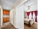 Spacious bedroom features a ceiling fan and access to a walk-in closet at 10612 Gum Tree Ct, Las Vegas, NV 89144