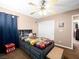 Bedroom with ceiling fan and a Minecraft-themed bed at 10612 Gum Tree Ct, Las Vegas, NV 89144