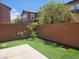 Backyard with artificial turf and mature trees at 11185 Saddle Iron St, Las Vegas, NV 89179