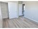 Bedroom featuring a spacious closet for storage and modern flooring at 11185 Saddle Iron St, Las Vegas, NV 89179