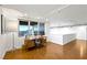 Bright office space with hardwood floors, a modern desk setup, and a large window offering scenic views at 11441 Allerton Park Dr # 212, Las Vegas, NV 89135
