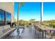 Expansive patio with stylish outdoor furniture, a dining area, and scenic views of the surrounding landscape at 11441 Allerton Park Dr # 212, Las Vegas, NV 89135
