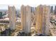 High-rise condo towers with golden windows offer stunning views of the surrounding cityscape at 125 E Harmon Ave # 2918, Las Vegas, NV 89109