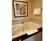 Relax in the jetted soaking tub with black marble surround, offering a spa-like experience at 125 E Harmon Ave # 2918, Las Vegas, NV 89109