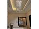 The building's entryway boasts a stunning chandelier and elegant architectural details at 125 E Harmon Ave # 2918, Las Vegas, NV 89109