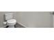 Bright bathroom featuring a white toilet and neutral wall paint at 12816 Alcores St, Las Vegas, NV 89141