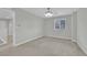 Bedroom featuring neutral walls, carpet, and a window allowing for natural light at 12816 Alcores St, Las Vegas, NV 89141