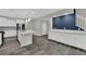 Bright kitchen featuring a central island, stainless steel appliances, and generous countertop space at 12816 Alcores St, Las Vegas, NV 89141
