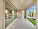 Covered patio featuring a sliding door and an outdoor water fountain at 12816 Alcores St, Las Vegas, NV 89141