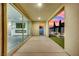 Extended patio with a view of the landscaped backyard, offering a serene outdoor escape and seamless transition to the indoors at 12816 Alcores St, Las Vegas, NV 89141