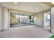 Sliding glass doors open to the covered patio and the home's interior at 12816 Alcores St, Las Vegas, NV 89141