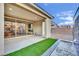 Modern patio featuring seamless indoor-outdoor flow, perfect for entertaining with a beautiful water feature at 12816 Alcores St, Las Vegas, NV 89141