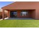 Spacious covered patio overlooking artificial turf and desert landscaping, great for entertaining at 1398 Pin Cushion Rdg, Mesquite, NV 89034