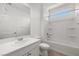 Bright bathroom featuring a shower-tub combo with tile floors at 1398 Pin Cushion Rdg, Mesquite, NV 89034