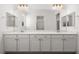 Bathroom with dual sinks and cabinets at 1398 Pin Cushion Rdg, Mesquite, NV 89034