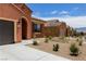 A well-maintained single-story house with desert landscaping and a view of the street at 1398 Pin Cushion Rdg, Mesquite, NV 89034
