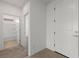 Hallway leading to bathroom and entrance at 1398 Pin Cushion Rdg, Mesquite, NV 89034