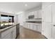 Bright and airy kitchen with granite countertops, stainless steel appliances and backyard access at 1398 Pin Cushion Rdg, Mesquite, NV 89034