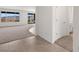 Open living area with tile and carpet flooring, offering great views and access to the backyard at 1398 Pin Cushion Rdg, Mesquite, NV 89034