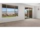 Bright, carpeted living room with views at 1398 Pin Cushion Rdg, Mesquite, NV 89034