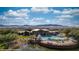 Inviting community pool and spa with stunning views of the mountains and desert landscape at 1398 Pin Cushion Rdg, Mesquite, NV 89034