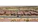 Aerial street view of single-story homes with desert landscaping and mountain views at 1398 Pin Cushion Rdg, Mesquite, NV 89034