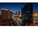 Nighttime scene of the city with high-rise residential towers at 145 E Harmon Ave # 2409, Las Vegas, NV 89109