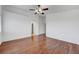 Bedroom with laminated wood floors and large windows at 1574 Ward Frontier Ln, Henderson, NV 89002