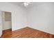 Bedroom with wood floors and attached bathroom at 1574 Ward Frontier Ln, Henderson, NV 89002