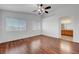Bedroom with laminated wood floors and access to the bathroom at 1574 Ward Frontier Ln, Henderson, NV 89002