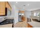 Kitchen with wood cabinets and stainless steel appliances at 1574 Ward Frontier Ln, Henderson, NV 89002