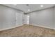 Comfortable bedroom with carpet flooring, white walls, and double door closet at 1600 Becke Cir, Las Vegas, NV 89104