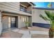 Front entryway showcases a metal door, with new landscaping, and a private balcony at 1600 Becke Cir, Las Vegas, NV 89104