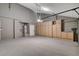 Spacious garage with ample storage cabinets and epoxy flooring for a clean, organized space at 1600 Becke Cir, Las Vegas, NV 89104