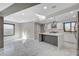 Bright, modern kitchen with sleek finishes and stainless steel appliances and marble floors at 1600 Becke Cir, Las Vegas, NV 89104
