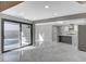 Open floor plan with pool view, living space and stylish kitchen with modern finishes at 1600 Becke Cir, Las Vegas, NV 89104
