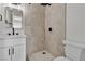 Contemporary bathroom with modern fixtures, tiled shower, and sleek vanity at 163 Greenbriar Townhouse Way, Las Vegas, NV 89121
