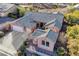 Aerial view of a single Gathering home featuring mature landscaping and a spacious driveway at 2039 Colvin Run Dr, Henderson, NV 89052