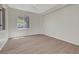 Cozy bedroom with ample natural light, wood floors, and a neutral color scheme at 2039 Colvin Run Dr, Henderson, NV 89052