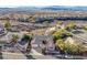 Charming single-story home with a two-car garage, desert landscaping, and breathtaking mountain views at 2039 Colvin Run Dr, Henderson, NV 89052