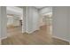Hallway view with wood flooring and white doors at 2039 Colvin Run Dr, Henderson, NV 89052