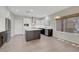 Modern kitchen features stainless appliances, central island, and bright natural light at 2039 Colvin Run Dr, Henderson, NV 89052
