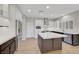 Spacious kitchen with stainless steel appliances, a large island, and modern fixtures at 2039 Colvin Run Dr, Henderson, NV 89052