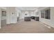 Open concept kitchen features stainless appliances, central island, and bright natural light at 2039 Colvin Run Dr, Henderson, NV 89052
